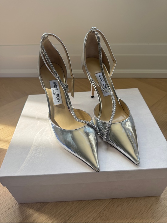 Jimmy Choo Shoes - Jimmy Choo Silver Metallic Pointed-Toe T-Strap Heels with Crystal Accents